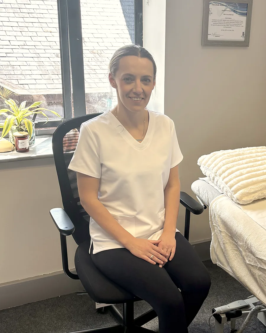 Megan Carty sitting in her treatment room at Old Quarter Clinic, Ballincollig